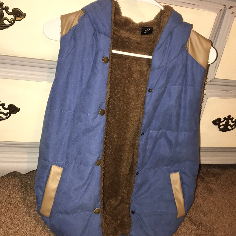 Blue and brown fur vest.